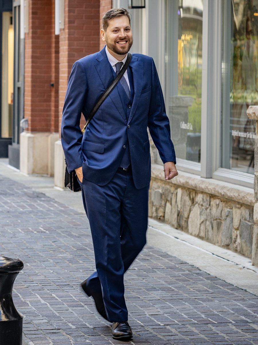 Eamon Lorincz walking in a Washington, DC mixed-use development